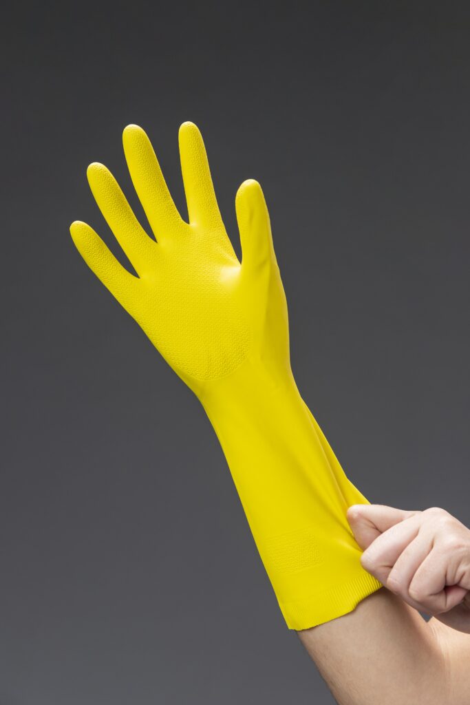close up woman hand with glove close up